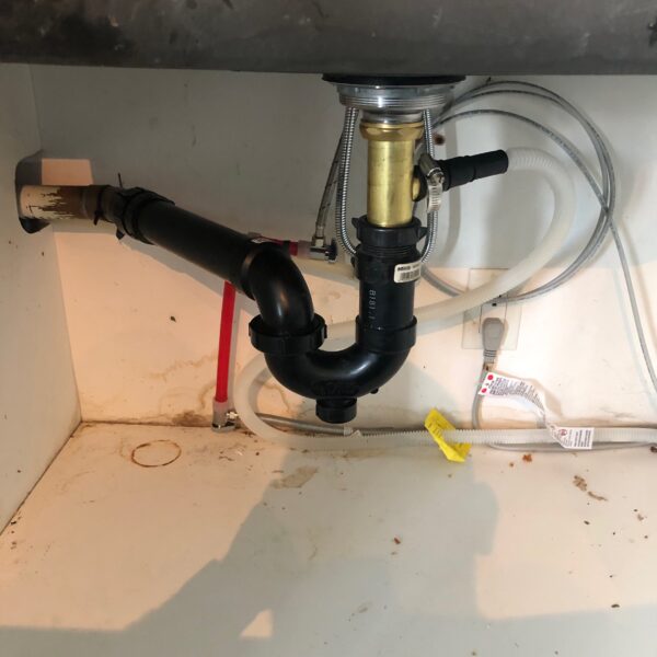 New drain under kitchen sink